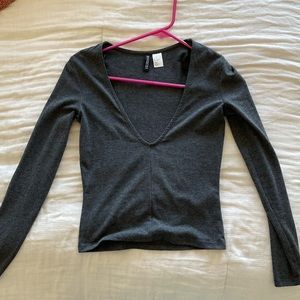 H&M deep cut dark grey shirt.